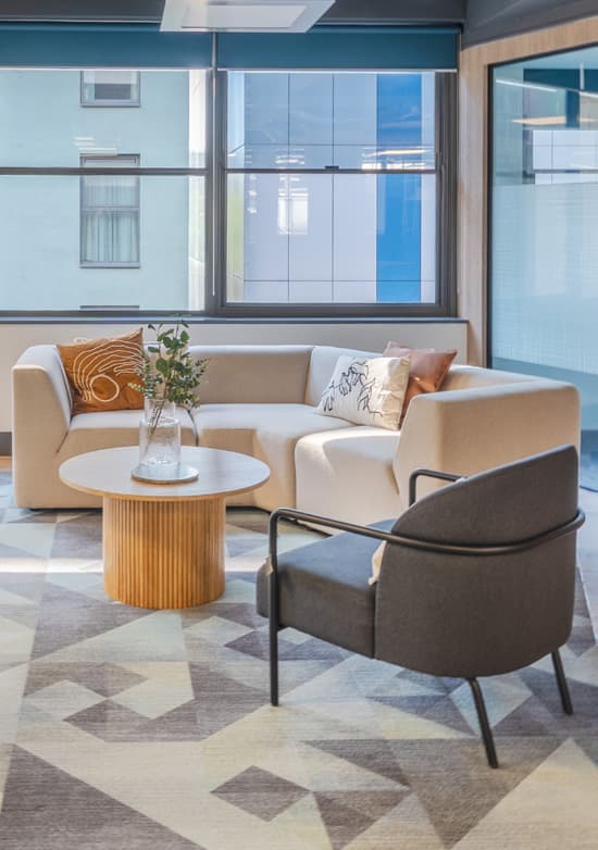 Glazed boardroom with navy chairs
